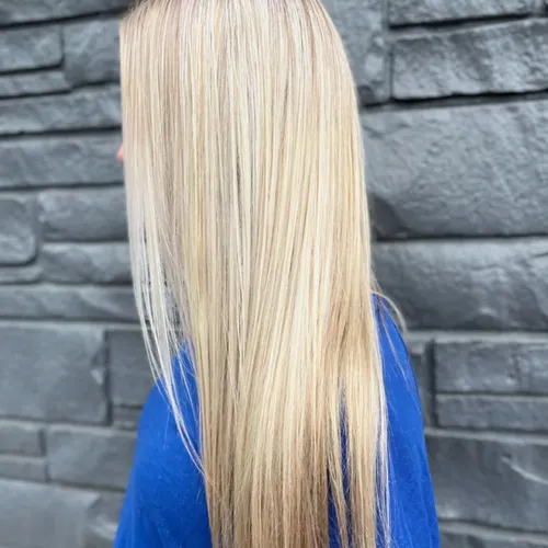 Bright, lived-in blonde balayage styled at Yours Truly Hair Salon in East Brainerd, Chattanooga